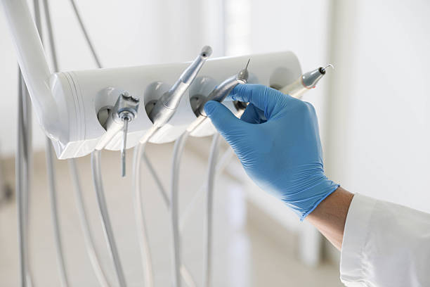 Professional Invisalign Clear Aligners technician working in Plano, KY